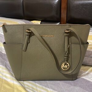 Michael Kors jet travel set